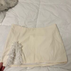 Fashion Nova Cream Mini Skirt with Feather Accent